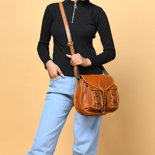 Classy Leather Bags women's crossbody sling with two pockets, adjustable strap, and sleek leather design for everyday style.