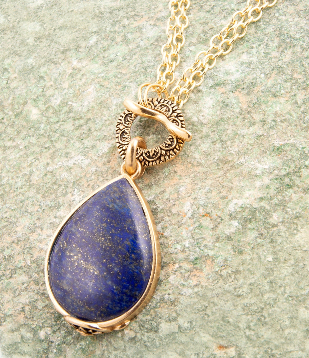 Barse Jewelry Abby Blue Lapis Pendant Necklace featuring a vibrant blue lapis stone with gold accents on a delicate chain.