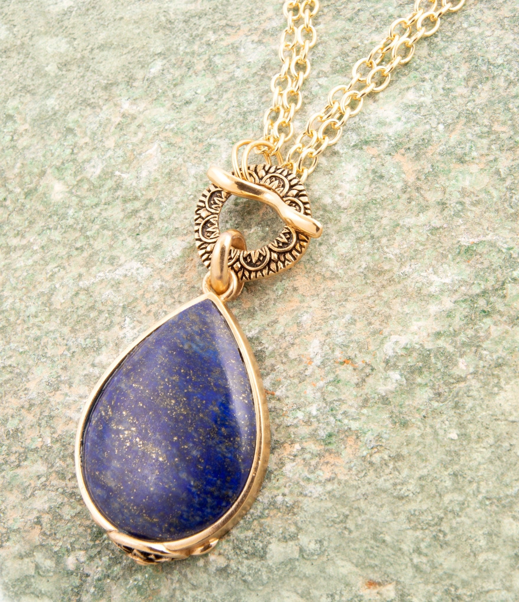 Barse Jewelry Abby Blue Lapis Pendant Necklace featuring a vibrant blue lapis stone with gold accents on a delicate chain.