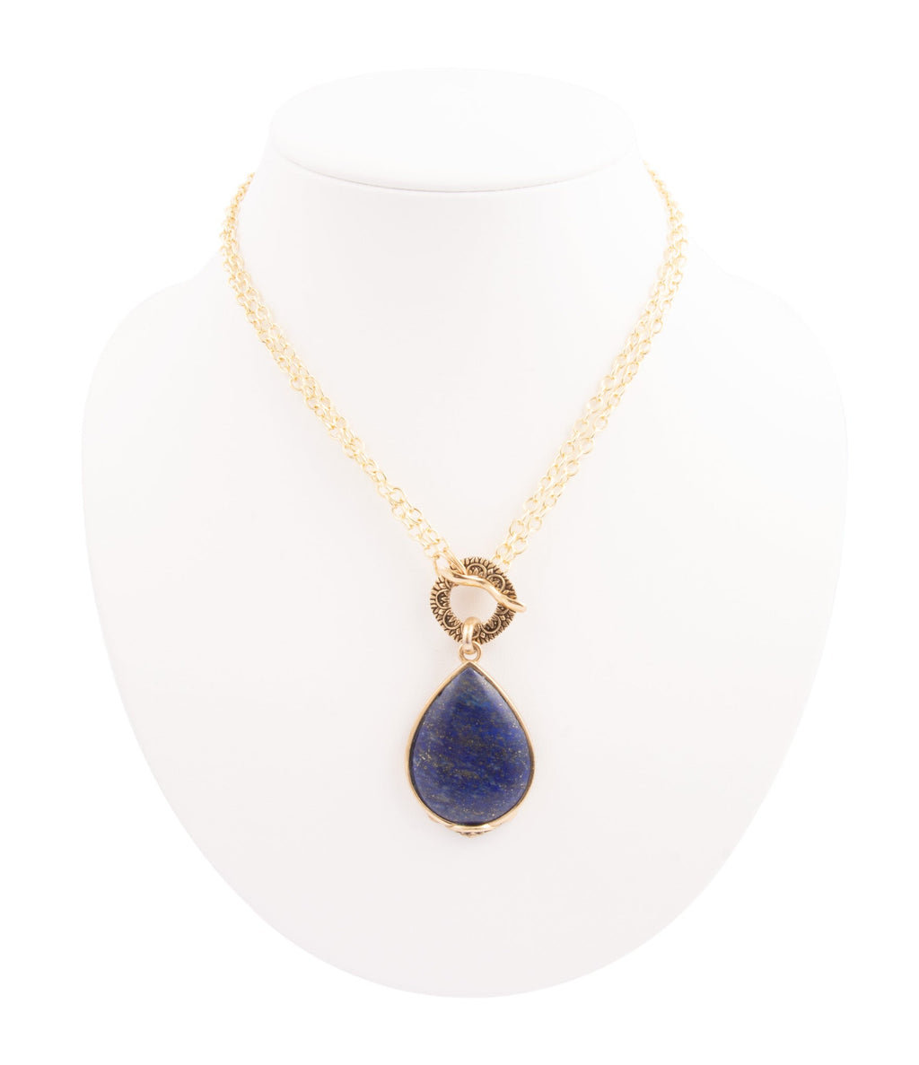 Barse Jewelry Abby Blue Lapis pendant necklace with a gold chain featuring a vibrant blue lapis gemstone.