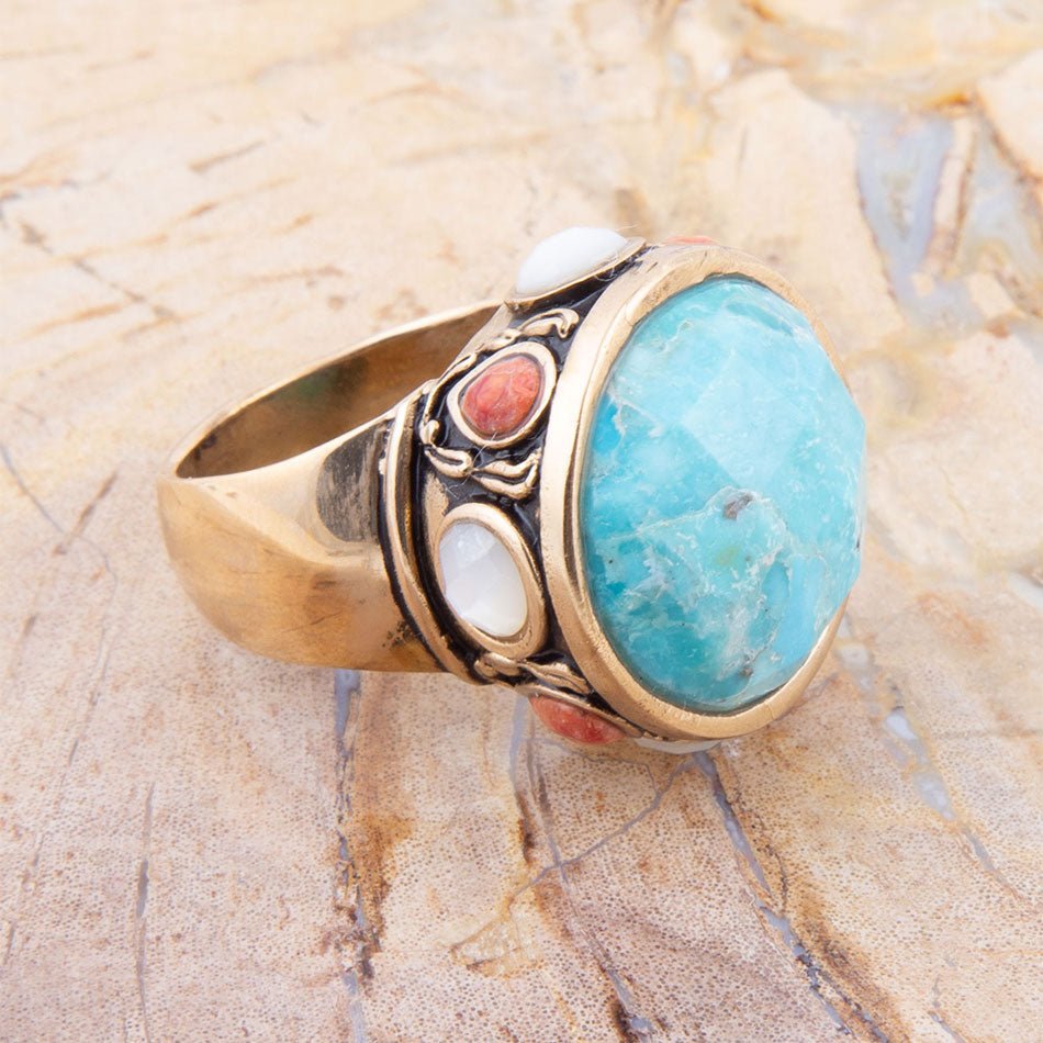 Barse Jewelry statement ring featuring blue turquoise, coral, and gold accents with intricate design details.