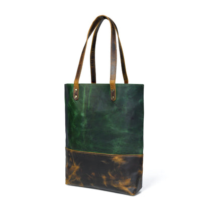 Green women's leather tote handbag with sturdy handles and spacious interior from Classy Leather Bags.