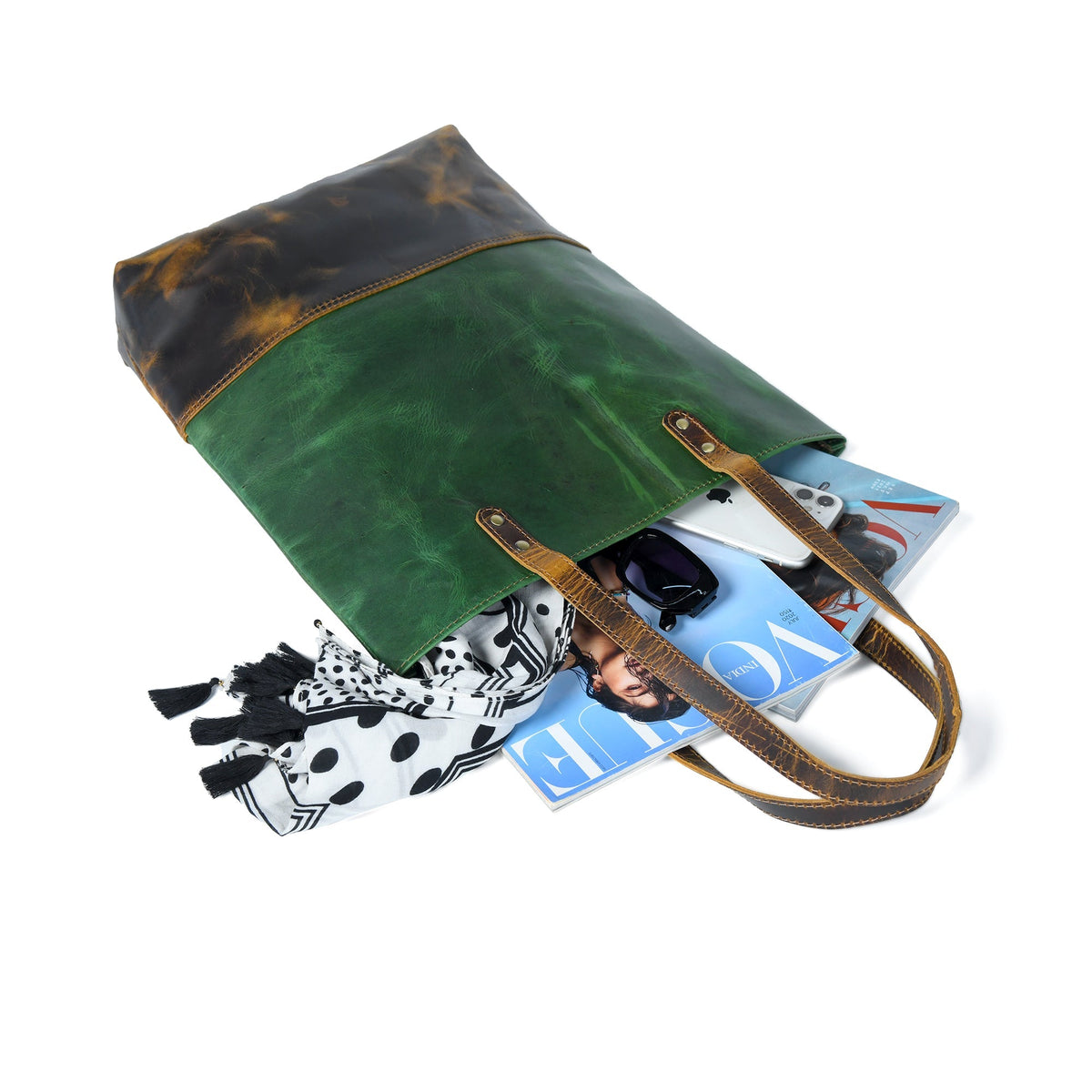 Green women's leather tote handbag with sturdy straps and spacious interior, crafted by Classy Leather Bags.