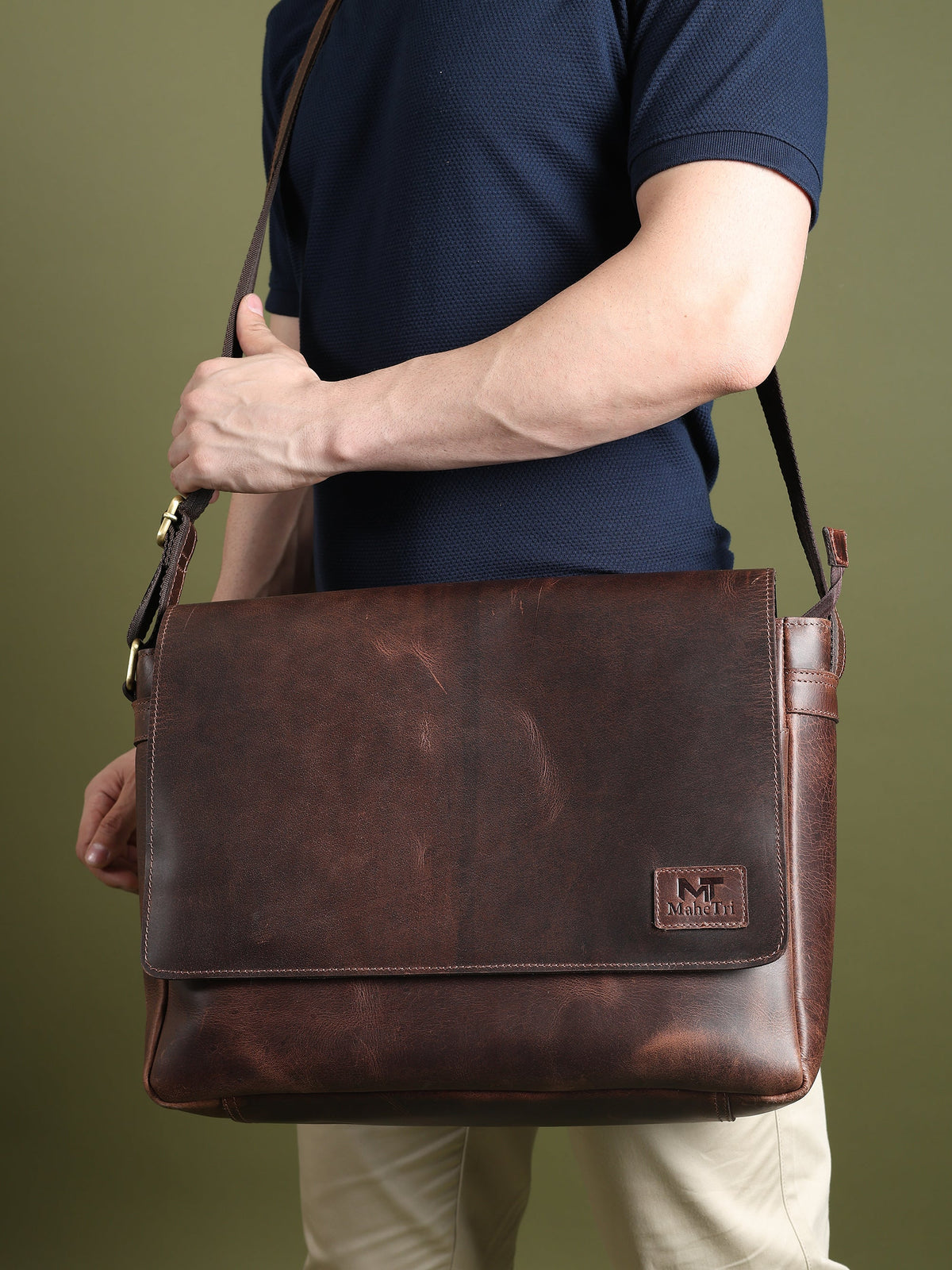 Genuine Sitka leather messenger bag from Classy Leather Bags, featuring a sleek design with a spacious interior for laptops.