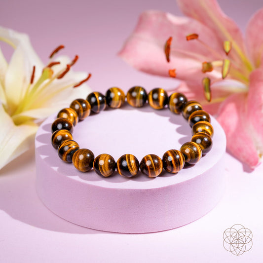 Conscious Items Built to Win 7A Grade Tiger’s Eye bracelet featuring polished tiger's eye beads on an elastic cord.