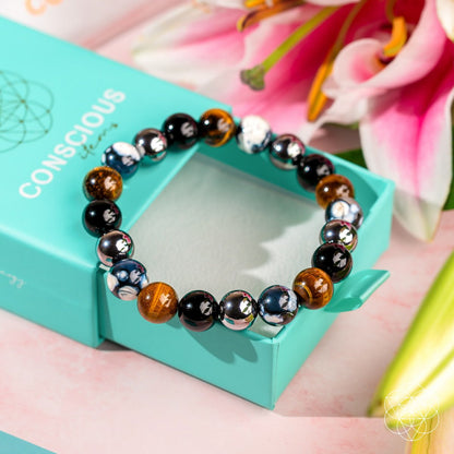 Orca’s Armor bracelet by Conscious Items featuring three protective and healing charms on a durable cord.