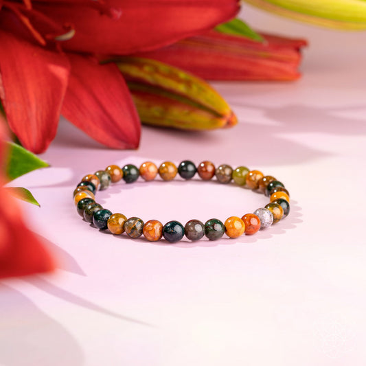 Ocean Jasper bracelet by Conscious Items featuring 6mm polished gemstone beads on an elastic cord for a stylish, natural look.