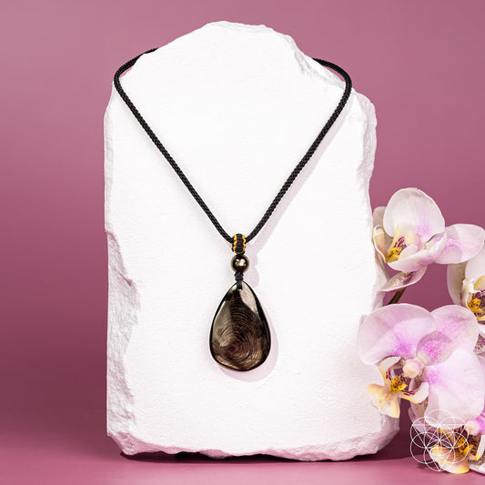Conscious Items Hypersthene Millionaire Manifestation Pendant necklace with a polished hypersthene stone on a fine chain.